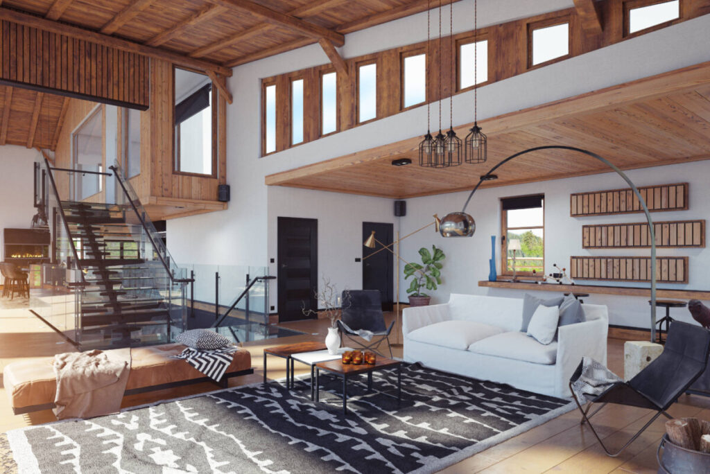 Wohnzimmeransicht eines Holzhauses mit zeitgemäßer Einrichtung.